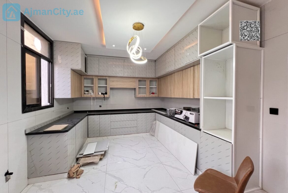Location: Al Helio 2, Land Area: 1,700 sq ft (including registration and ownership fees)Built-up Area: 3,200 sq ftPrice: AED 1,350,000Features:Ground floor with a fully open layout including a spacious living room, open kitchen, and maid’s room5 master bedrooms on the first floor, providing complete privacy for each family memberPractical storage under the stairs to make the most of every square meterSecond floor includes an additional master bedroom (the fifth), a large living room, and a spacious terrace ideal for family gatherings and barbecuesDedicated laundry room space7 bathroomsElegant stone facades and a luxurious marble staircase